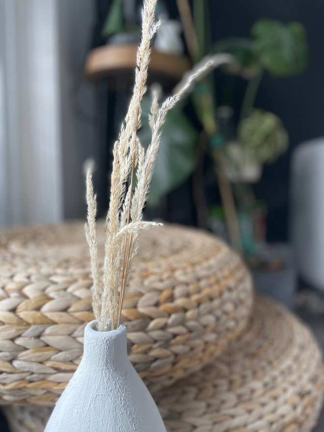 Floor vase with dry foxtail grasses